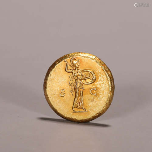 An inscribed golden coin