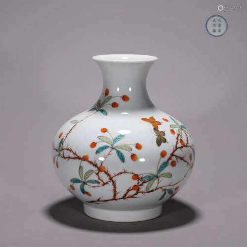 A famille rose flower and butterfly porcelain zun