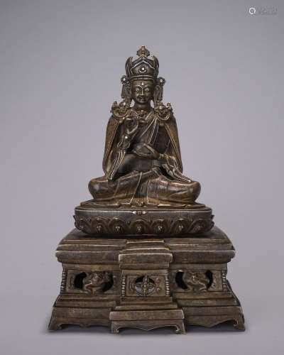 A copper silver-inlaid Padmasambhava statue