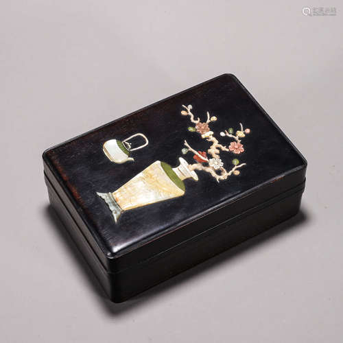 A red sandalwood gem-inlaid box