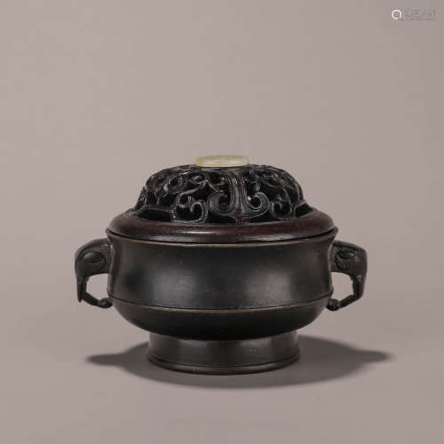 A copper censer with elephant head-shaped ears
