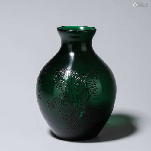 An inscribed fruit patterned glass vase