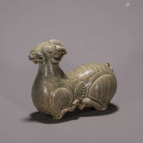 A Yue kiln celadon porcelain sheep ornament