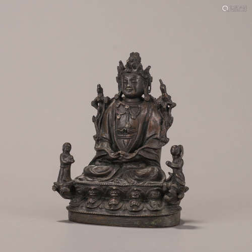 A copper buddha statue