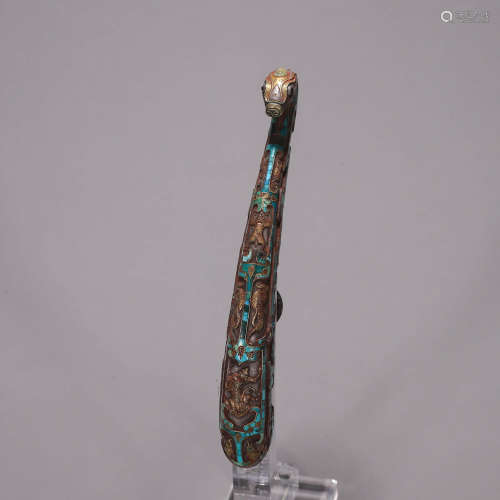 A silver turquoise-inlaid hook