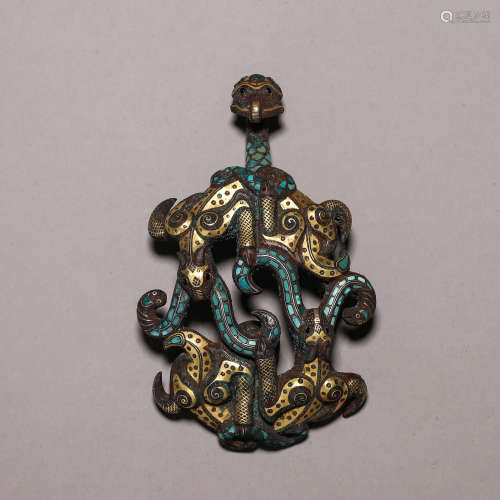 A bronze turquoise-inlaid hook