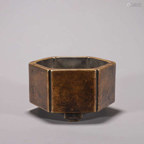 A hexagonal copper censer