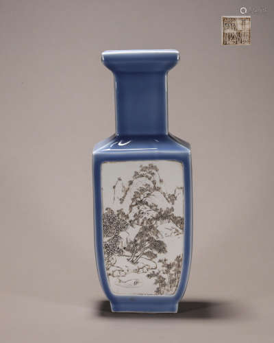 A landscape carved blue glazed porcelain vase