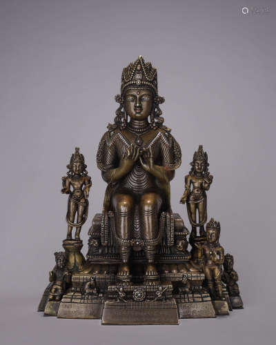 A Tibetan copper silver-inlaid Maitreya statue