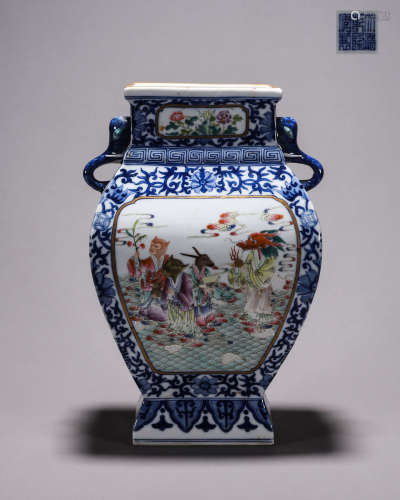 A blue and white famille rose porcelain zun with elephant he...