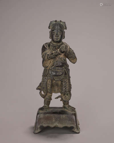 A copper figure statue