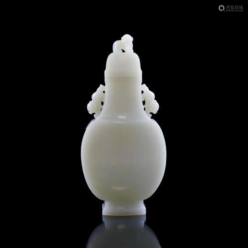 THREE FU DOGS LIDDED WHITE JADE VASE