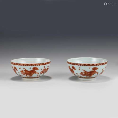 PAIR IRON RED MYTHICAL BEAST MOTIF BOWLS