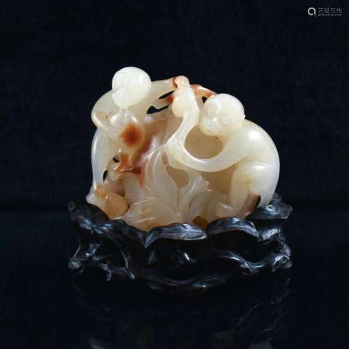 CARVED WHITE JADE OF PEACH AND MONKEYS