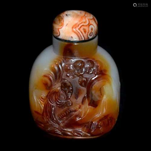 A Finely Carved Figural Agate Snuff Bottle