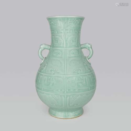 Qing, A Very Fine and Massive Celadon Glazed Zun Molded