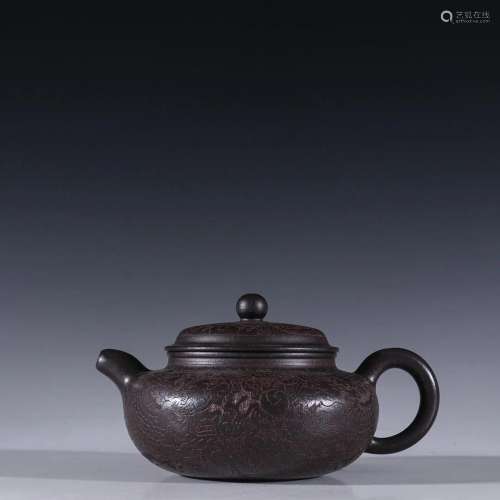 A Fine Black Gold Caly Teapot With Dragon Pattern