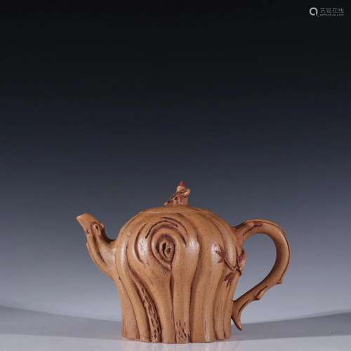 A Delicate Golden Clay Teapot