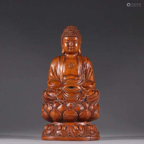 A Carved Huangyang Wood Figure of Sakyamuni