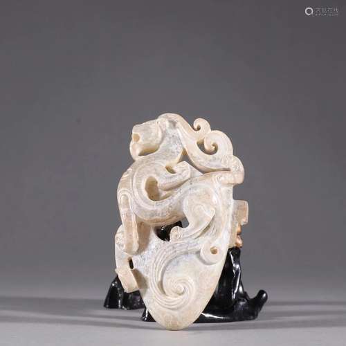 A Carved Jade Dragon Pendant