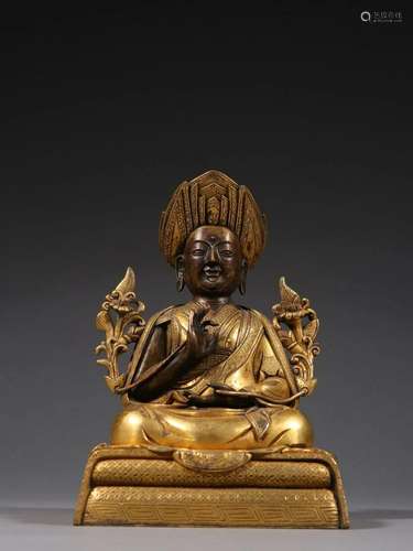 A Gilt-bronze Figure of Buddha