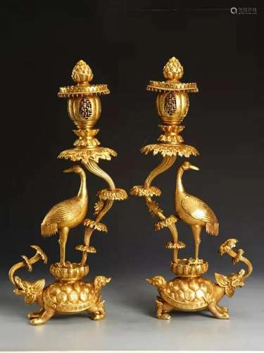 A Fine Pair of Gilt-bronze Candlesticks