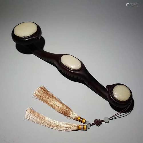 A White Jade Inlaid Wood Ruyi Scepter