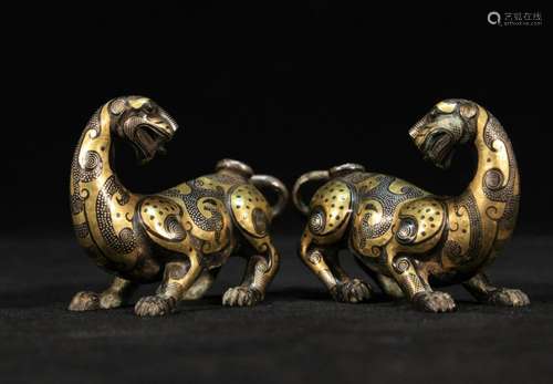 A Pair of Bronze Inlaid Gold and Silver Dragons