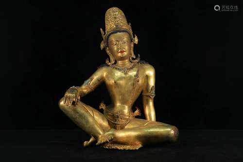 A Gilt-bronze Figure of Buddha