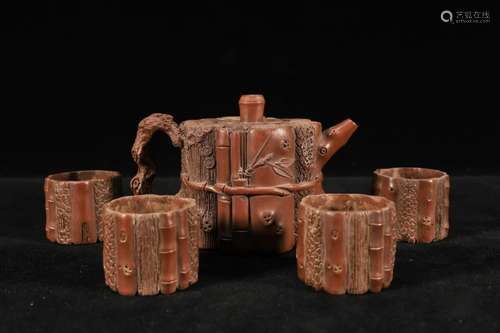 A Set of Yixing Clay 'Tree Stump' Teapot