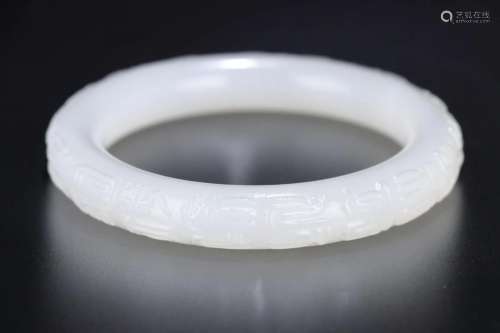 A Carved Hetian Jade Bangle