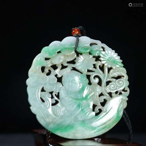 A Delicate Carved Jadeite Pendant