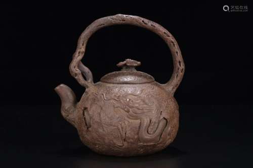 A Yixing Clay Ewer With Handle
