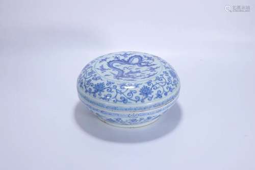 A Blue And White Box And Cover