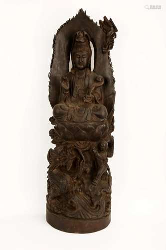 A CHINESE ROSEWOOD OR HARDWOOD STATUE CARVED WITH