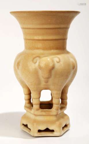 A RU WARE CELADON ZUN-FORM VASE WITH A DESIGN OF THREE