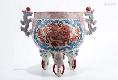 A DOUCAI TRIPOD CENSER WITH TWO EARHANDLES. THE BASE