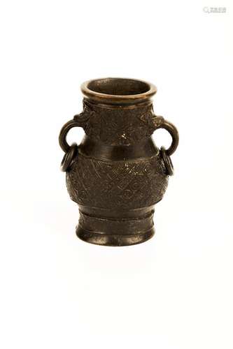 A QING DYNASTY BRONZE RITUAL VASE WITH TWO EARHANDLES,