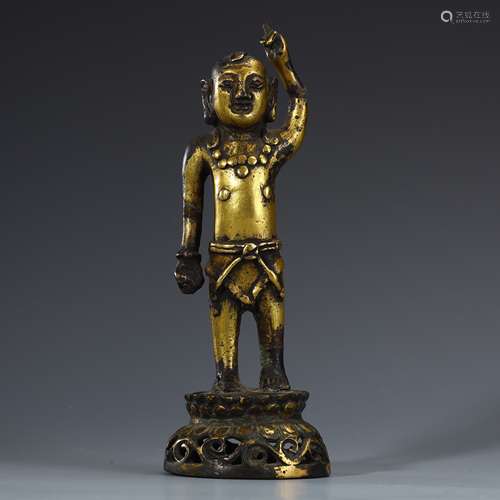 Ancient bronze-gilded boy statue