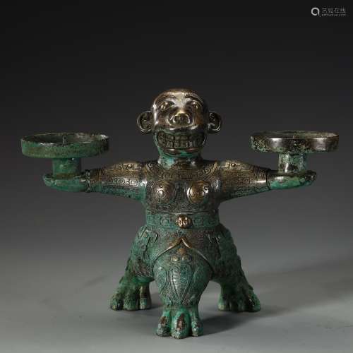 Ancient bronze figurines lampstand