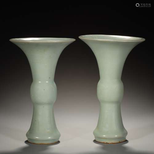 A pair of celadon flower vases