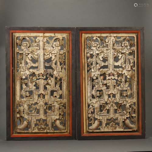 A pair of wooden dragon window grilles in early Qing Dynasty