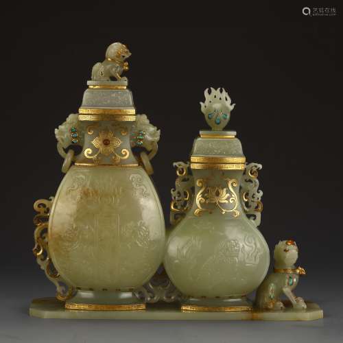 A pair of ancient white jade gold-wrapped jade conjoined bot...