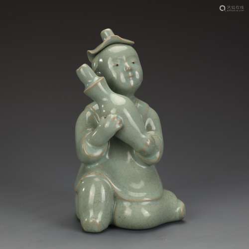 Ancient celadon boy statue