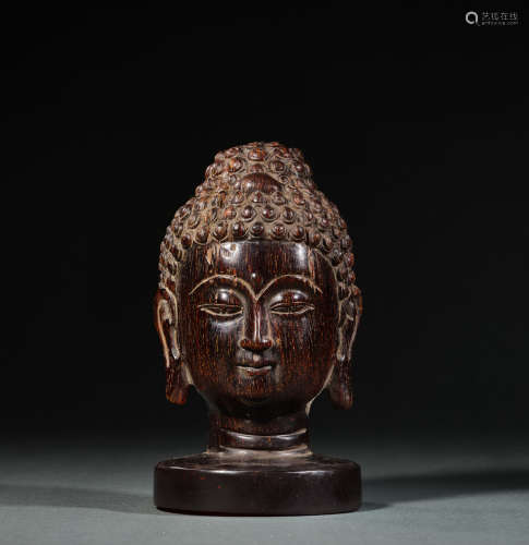 A Buddha Head Horn Figure Statue