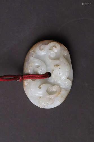 A Jade Dragon Bi Ornament