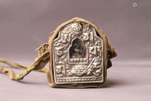 A White Bronze with Buddha Figure