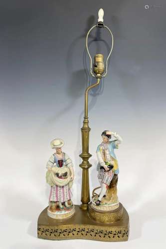 A VINTAGE LAMP WITH EUROPEAN FIGURINES
