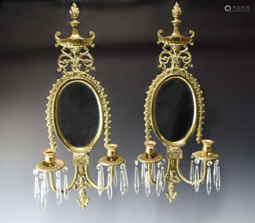 A PAIR OF VINTAGE WALL-MOUNT CANDLE HOLDERS WITH MIRROR