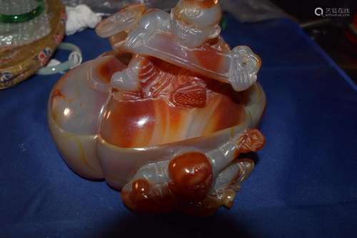 agate carving boys with treasure.